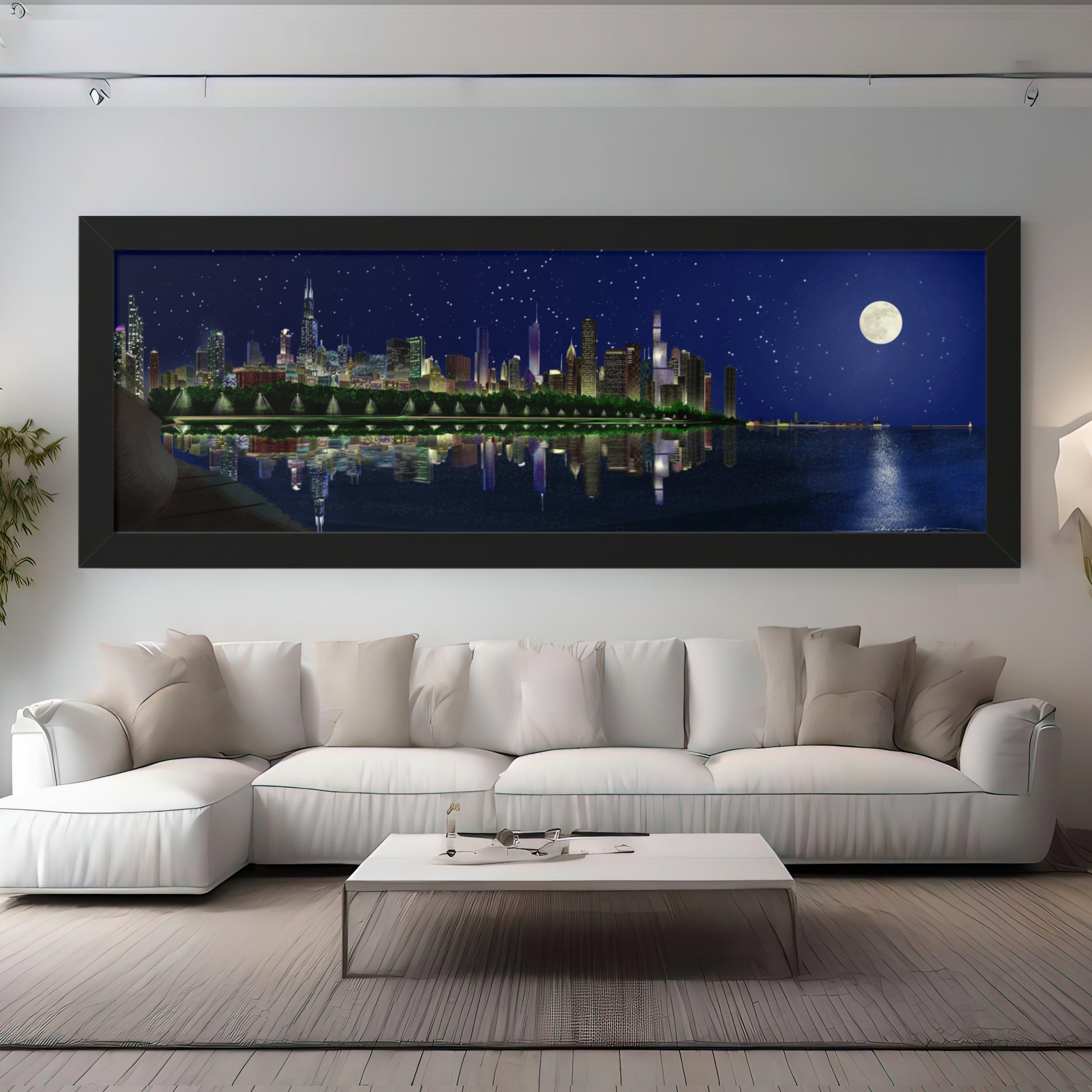 The essence of a Chicago summer night. Featuring a digital illustration of the iconic skyline, this framed print showcases a stunning panorama stretching from Shedd Aquarium to Navy Pier, where the large full moon above shines over the glowing city. Here it is framed in black.
